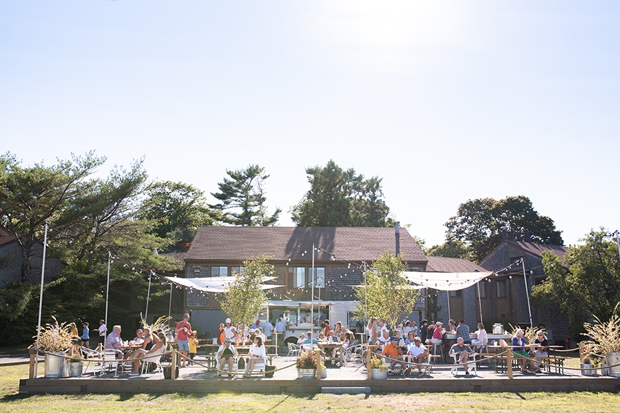 People on patio at Island Creek